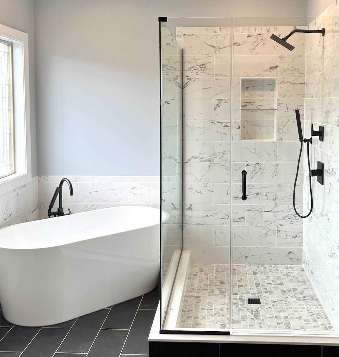 Freestanding Tub and Tile Shower with Frameless Glass