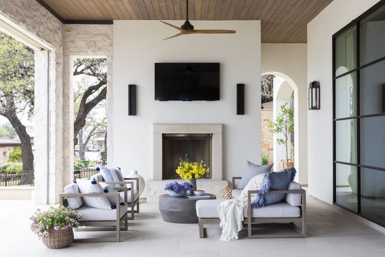 Patio with fireplace and outdoor TV